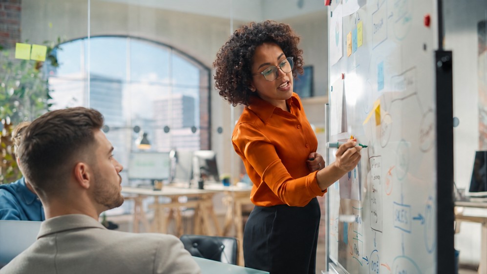 Business owner reviewing operations dashboards and workflows
