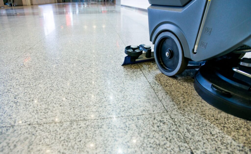 Floor cleaning machine on a polished commercial lobby floor